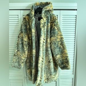 Fashionable Urban Outfitters brand fur coat. Good for the streets of NY or UK.